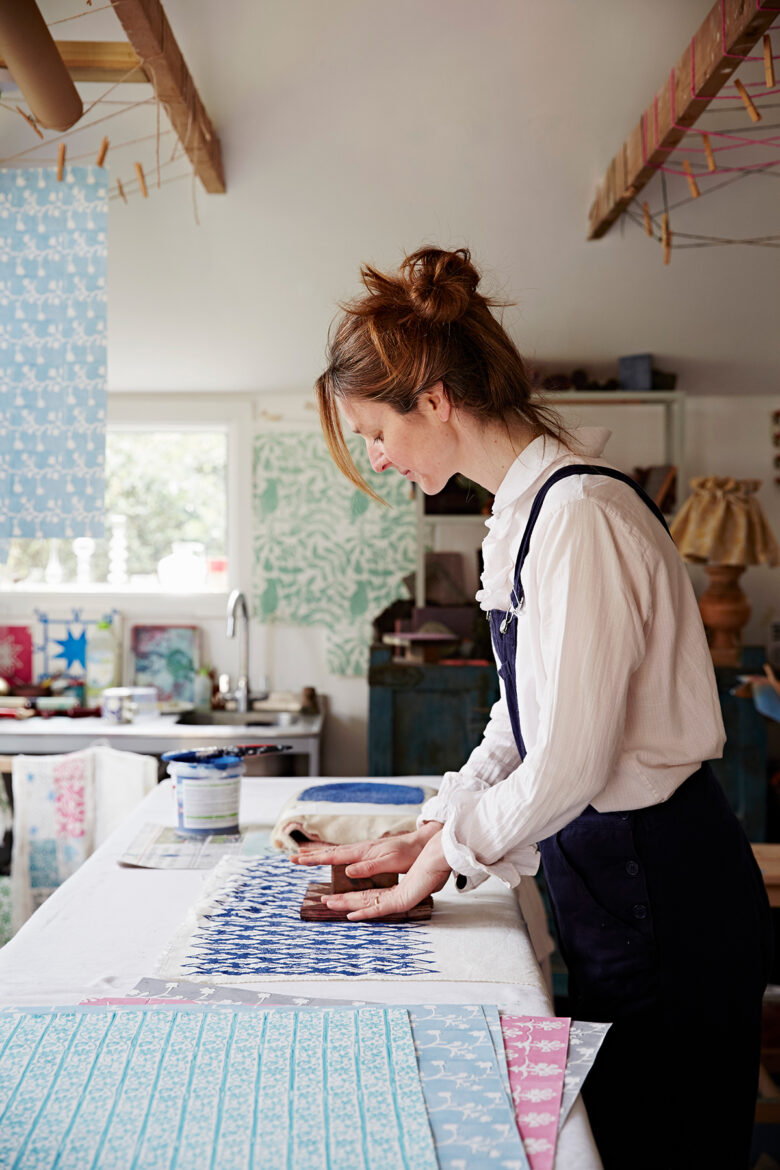 Designer and block print-maker Molly Mahon uses wooden blocks to print fabric at her studio at her home in Ashdown Forest, East Sussex